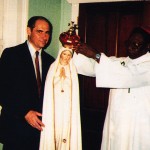 Retired Custodian Louis Kaczmarek with Bishop Osmond Martin of Belize City as his Excellency crowns the International Pilgrim Virgin Statue. 